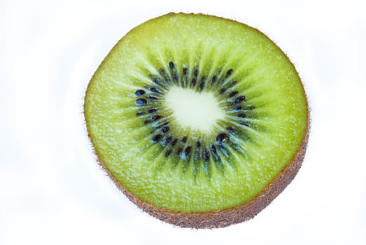 Kiwi fruit sliced segments isolated on white background