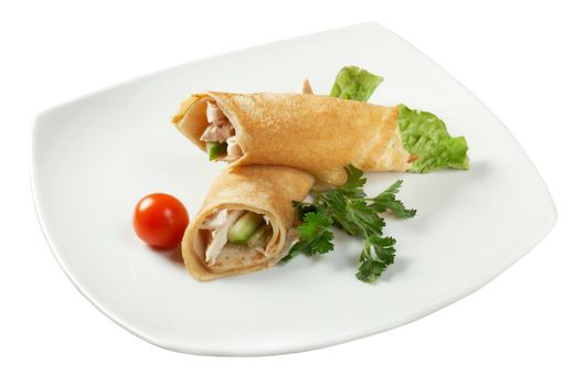 rolled pancakes stuffed chicken. Shallow depth-of-field.