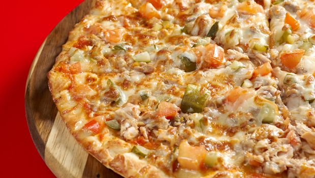 Pizza with smoked hen. italian kitchen. Studio