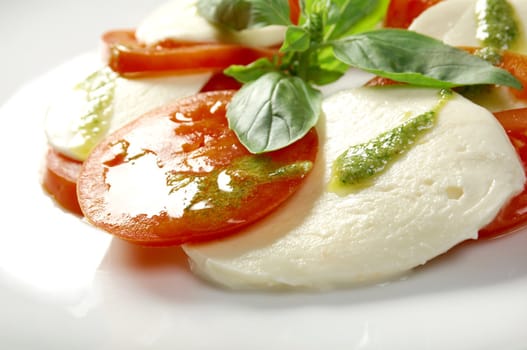 Italian cuisine.Arrangement of mozzarella and tomatoes