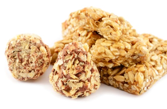  Truffle chocolates and seeds in caramel on an isolated white background