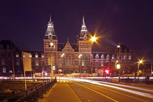 Newly restored medieval building Rijksmuseum in Amsterdam at night in the Netherlands