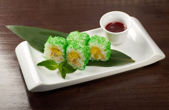 Japanese sushi  traditional japanese food.Roll made of Smoked fish and green roe