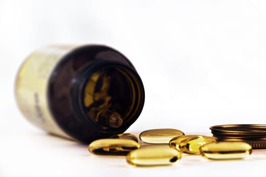 Yellow Fish Oils Isolated on White Background