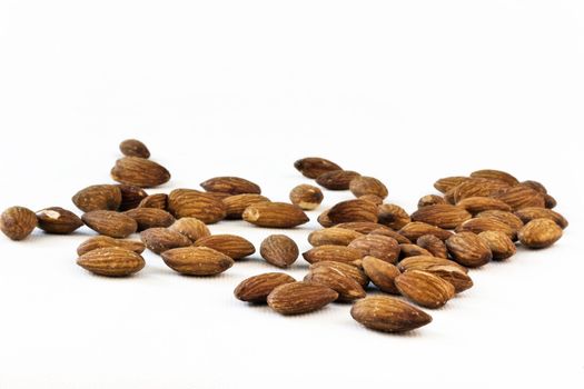 Almonds on isolated white background