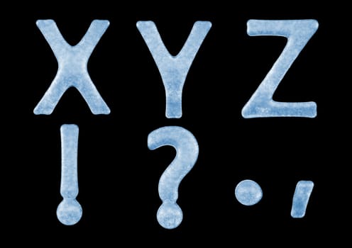 Uppercase X-Y-Z Lettters and Accents (Question Mark, Dot, Comma and Exclamation Mark) Frozen Ice Type style isolated on black background