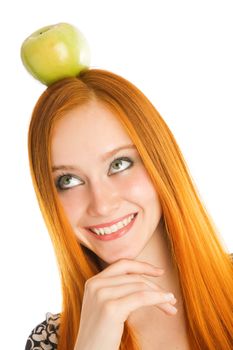young girl with green apple on the head