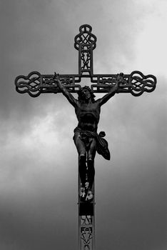 jesus in the cross , an iron statue