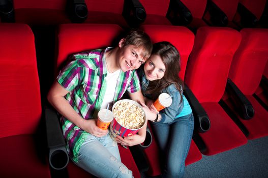 couple in a movie theater, watching a 3D movie