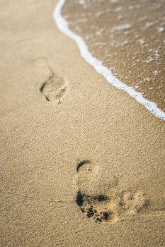 An image of some footprint in the sand