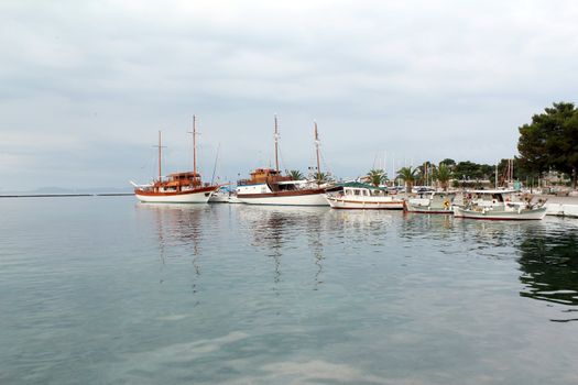 port with sailboat and fishing boat