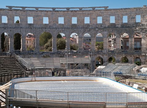 old amphitheater prepares for modern game - ice hockey