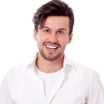 smiling successful man in casual business outfit isolated on white background