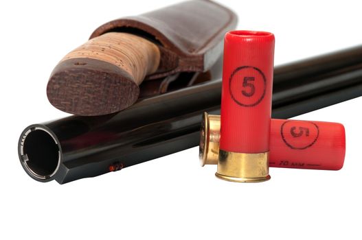 Shotgun cartridges and a hunting knife on a white background.