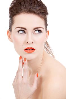 perfect beauty woman face with orange lips isolated on white background