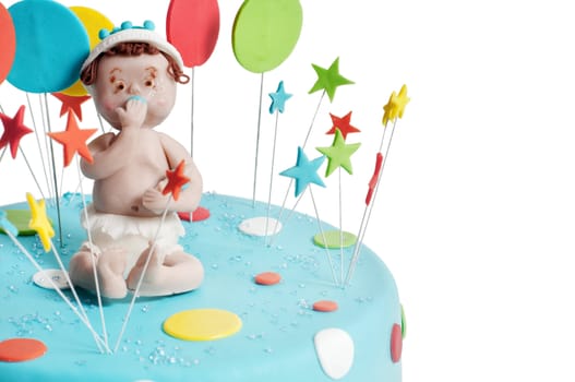Studio shot of blue birthday cake on light background