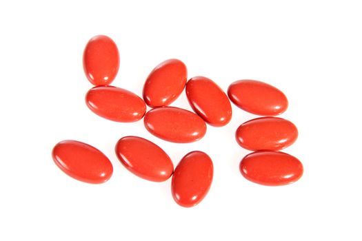 Red pills, isolated on white