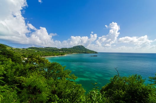 Stunning Caribbean bay on a lush green tropical island