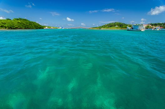 View of beautiful Caribbean water with a far away bridge in San Andres y Providencia, Colombia