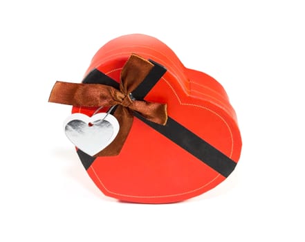 Red Heart-shaped box in heart shape on white background