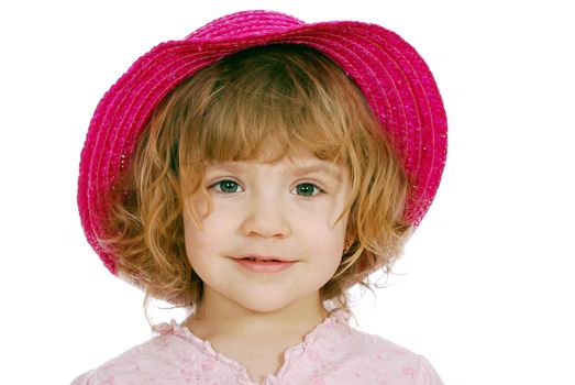 Little girl with red straw hat studio shot
