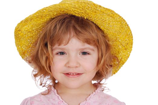 Little girl with yellow straw hat studio shot