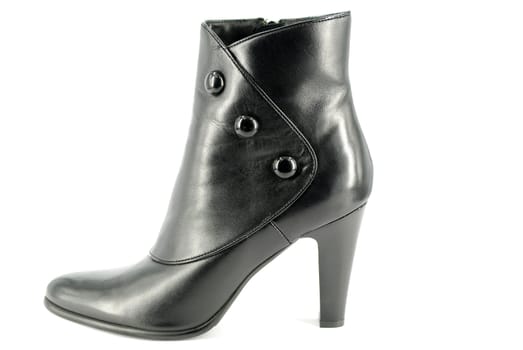 Woman black leather boot on white