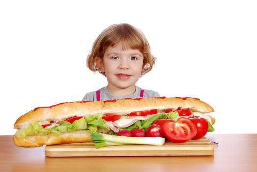 Beauty little girl with sandwiches and vegetables