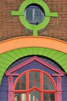 Detail of brightly colored brick Building