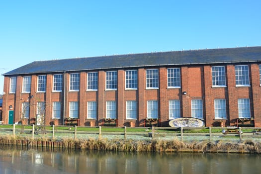 Rectangular Brick warehouse by river