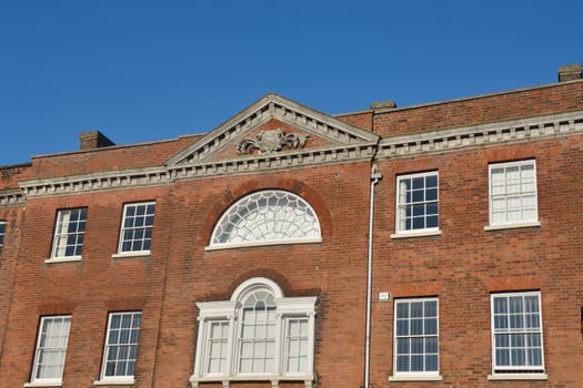 Traditional red brick building with windows