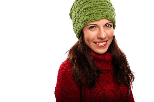 Attractive young caucasian woman in red sweater on white background