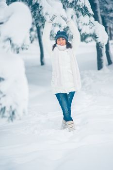 Portrait of beautiful young girl in winter day