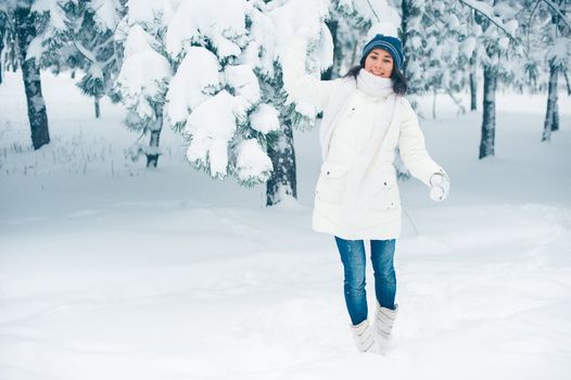 Portrait of beautiful young girl in winter day