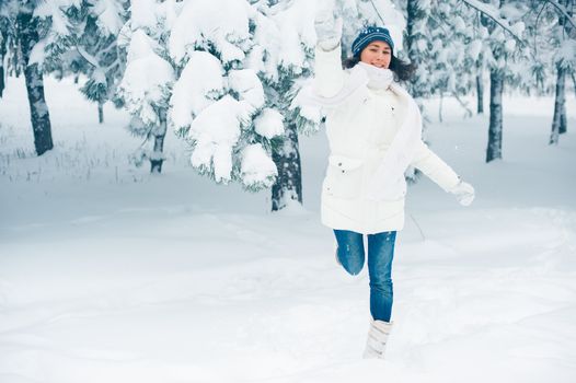 Portrait of beautiful young girl in winter day