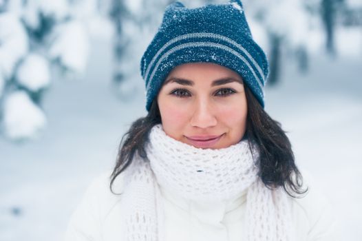 Portrait of beautiful young girl in winter day