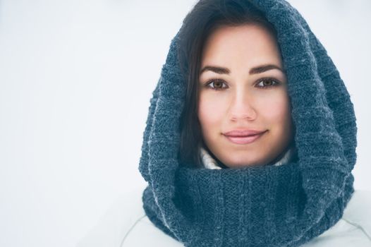 Portrait of beautiful young girl in winter day