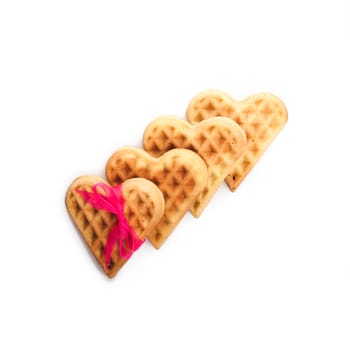 Heart shaped waffle isolated on white background