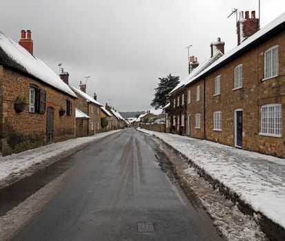 Abbotsbury village covered in snow in rural dorset england