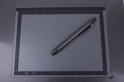 photo of graphic tablet with pen