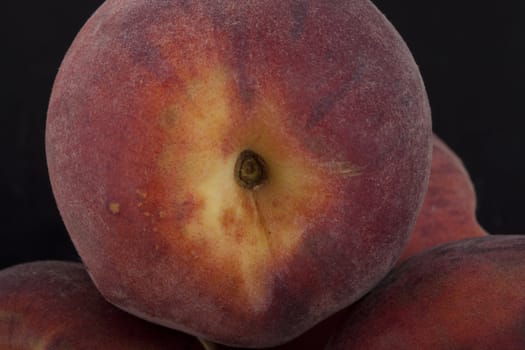 photo of peaches on a black background