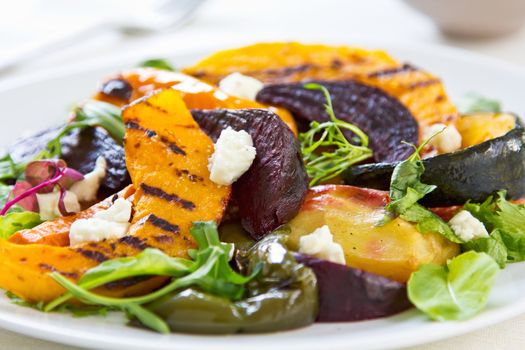 Grilled varieties of vegetables with Feta cheese  and rocket salad