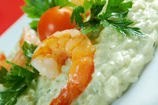 Delicious italian risotto with shrimps. Close-up