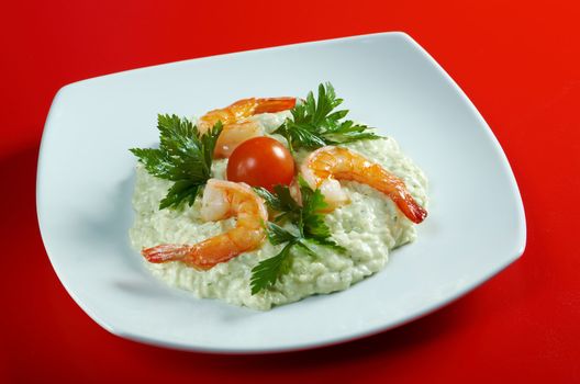 Delicious italian risotto with shrimps. Close-up