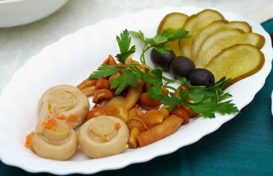 Snacks of vodka.mushrooms and marinated pickles