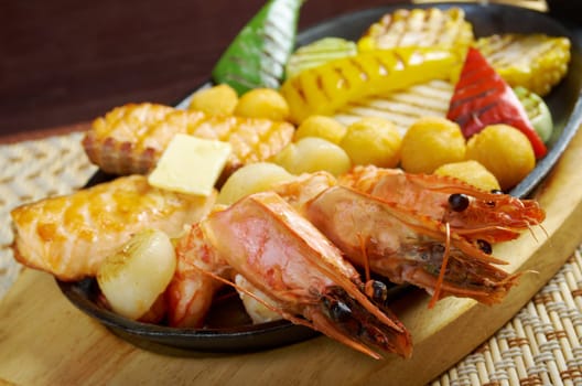 Japanese cuisine .Salmon Steak with royal prawn