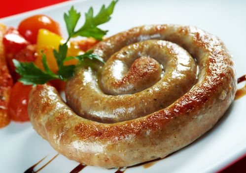 Sausage making roasted with vegetable