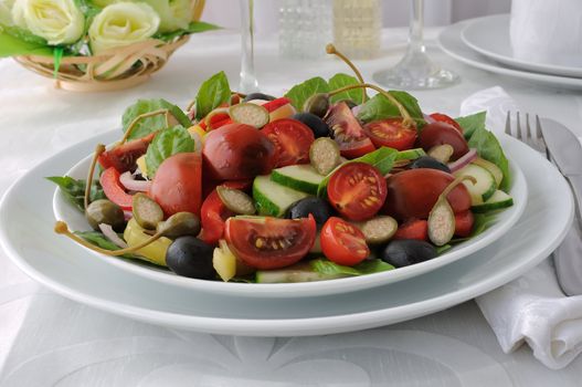 Salad of summer vegetables with basil and capers