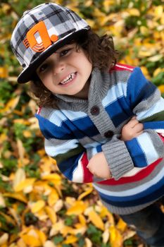 Happy child in the forest is having fun