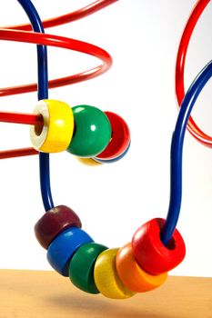 Colourfull spiral development toy for kids with red and blue wire